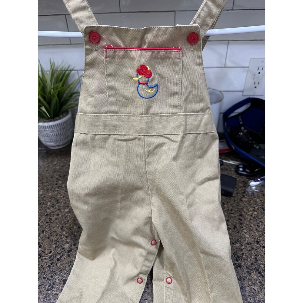 vtg brown bib overalls with embroidered duck 9 mos